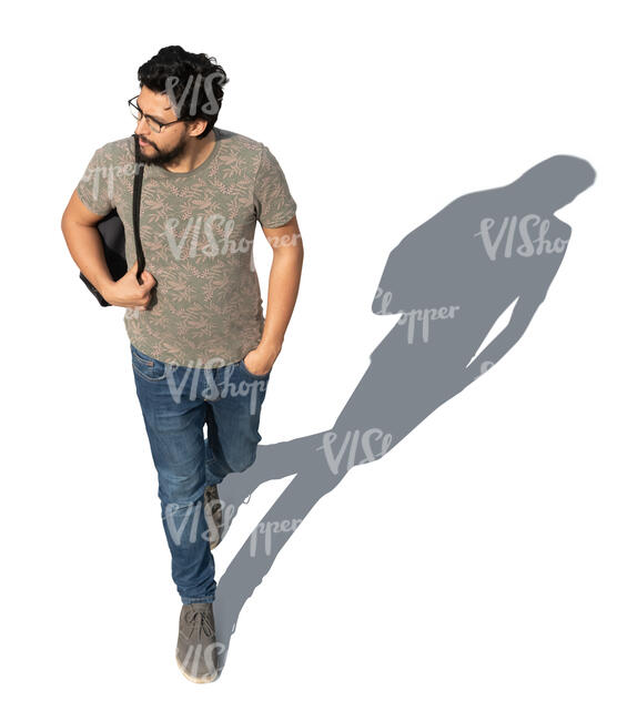 dark haired man walking seen from above