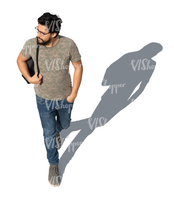 dark haired man walking seen from above