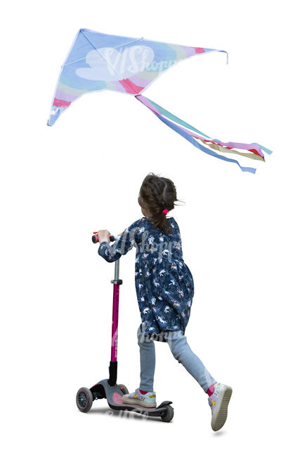 little girl with a kite riding a scooter