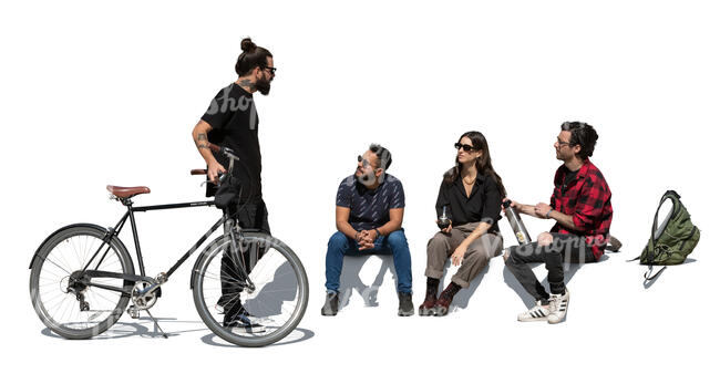 man with bike standing and talking to his friends