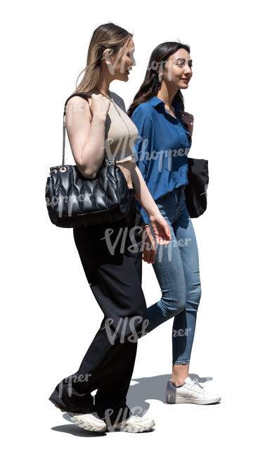 two women walking outside in summer