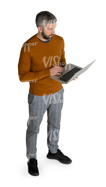 man with a laptop standing seen from above