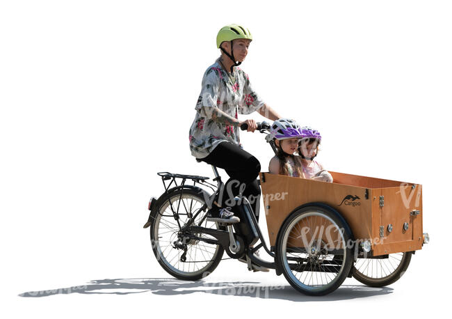 backlit family riding a cargo bike