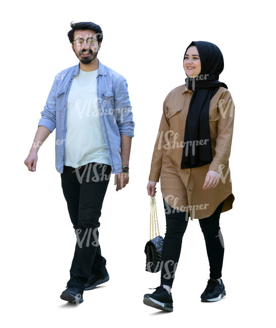 middle eastern man and woman walking