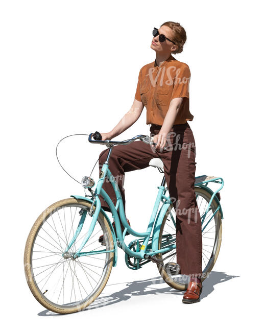 woman with a bicycle standing in the sun