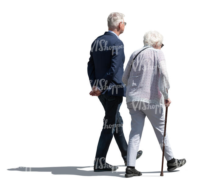 elderly couple with a walking stick walking