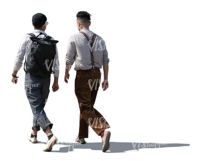 two backlit stylish men walking