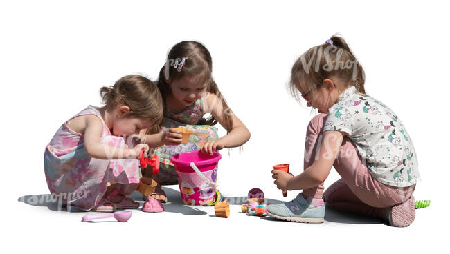 group of girls playing in the sandbox