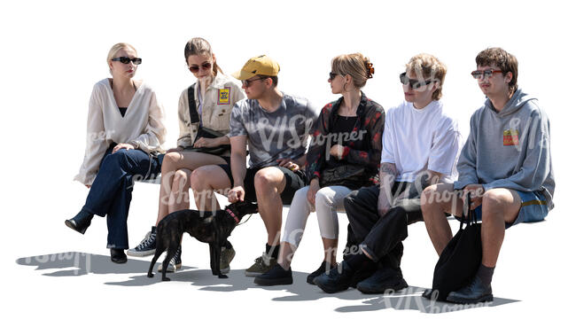 group of young people and a dog sitting in a row