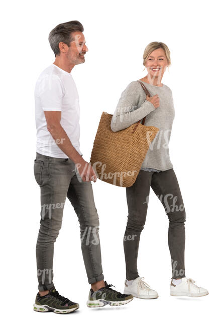 middle aged man and woman walking