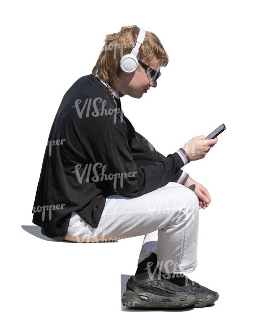 man with headphones sitting