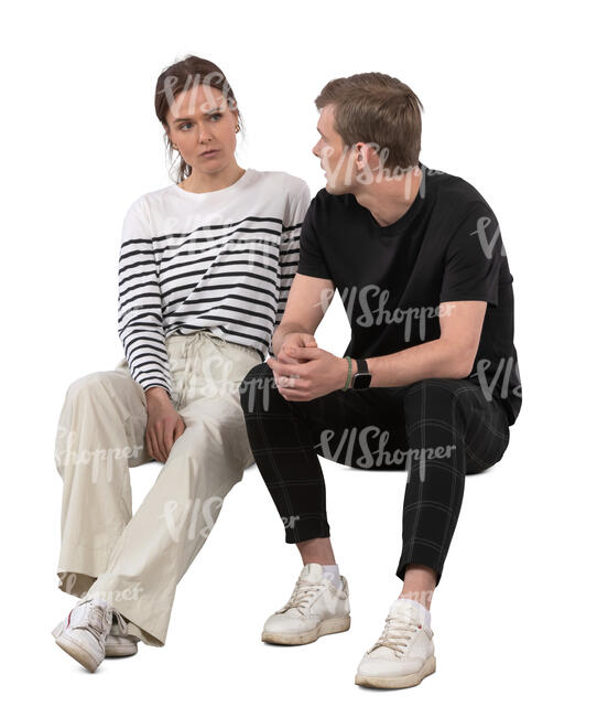 man and woman sitting and talking