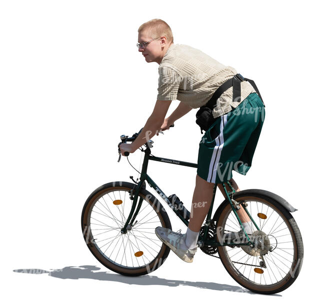 young man riding a bicycle