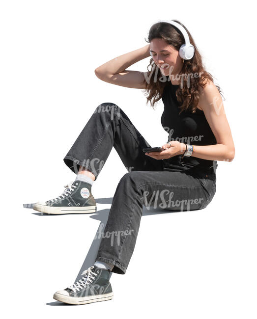 woman sitting and listening to music