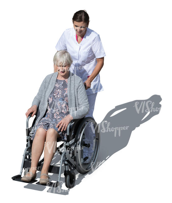 nurse pushing a woman in a wheel chair seen from above