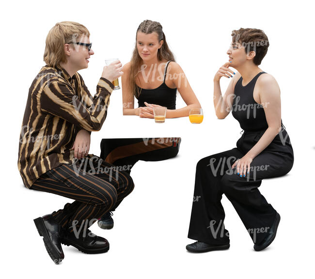 group of three people sitting and talking in a coffeeshop
