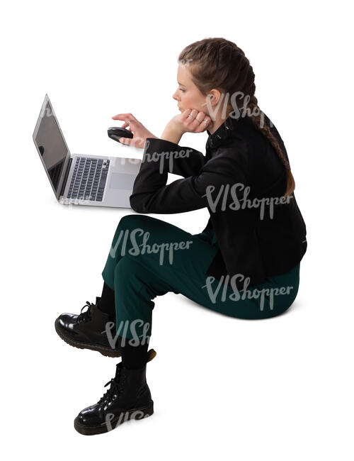 woman sitting at a desk and working seen from above