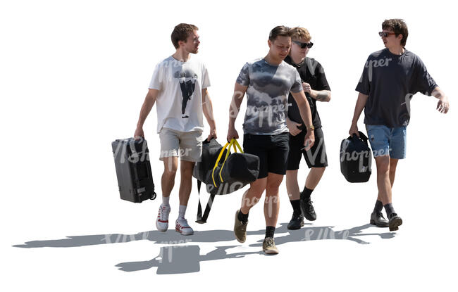 backlit group of men with heavy bags walking