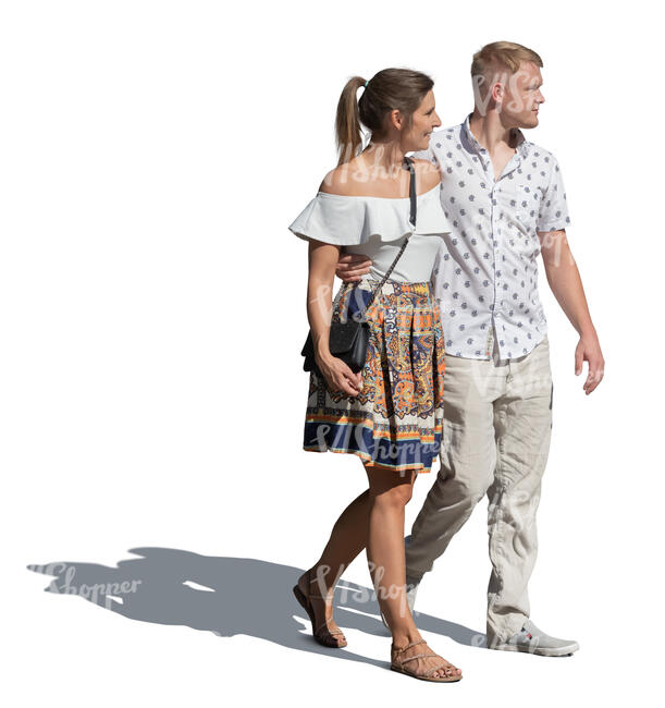 couple walking in sunlight