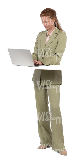 woman standing by a desk and working with a computer