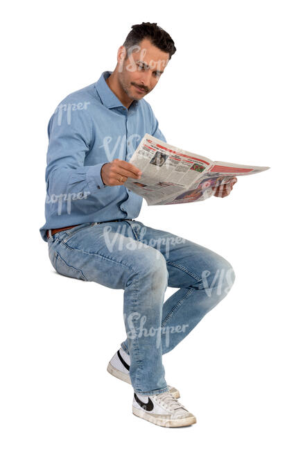 man with moustache sitting and reading a newspaper