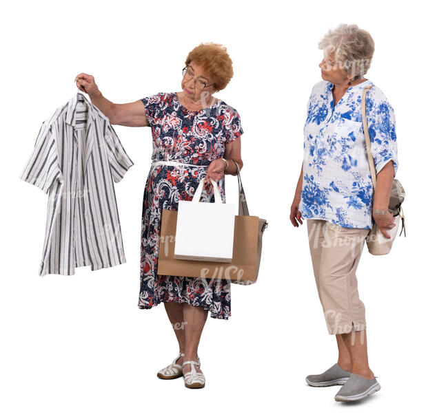 two older ladies standing and shopping