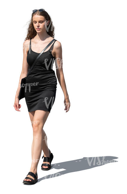 woman in a black mini dress walking