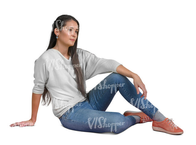 woman sitting casually on the ground
