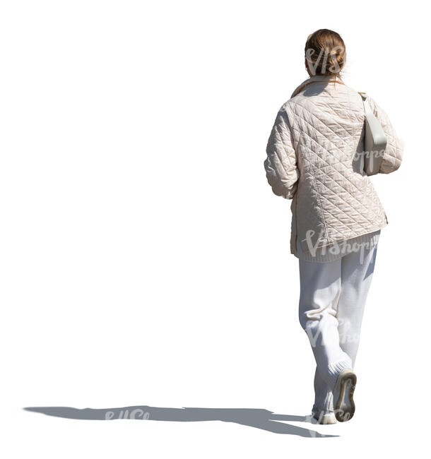 woman in a white autumn jacket walking