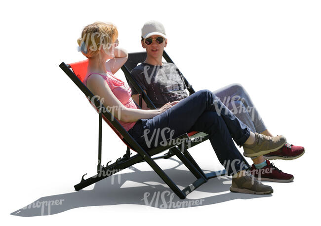 two people sitting in garden chairs