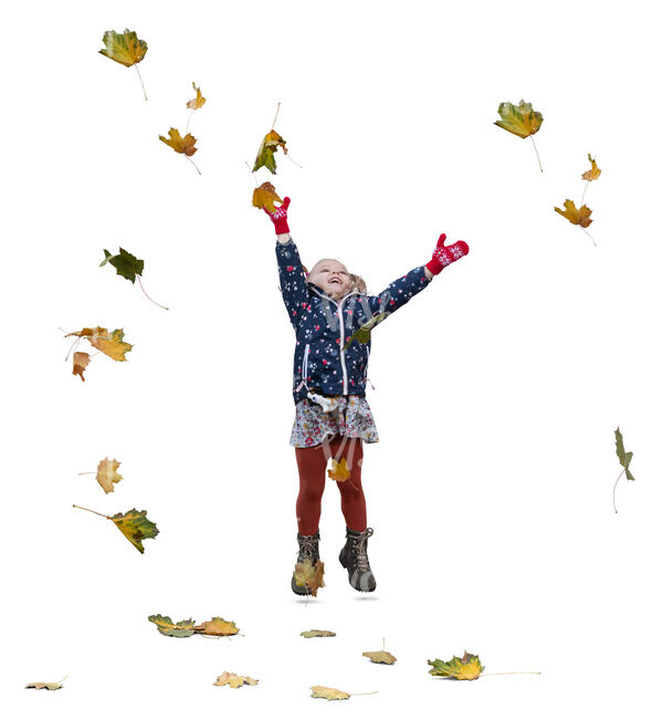 little girl jumping and playing with autumn leaves