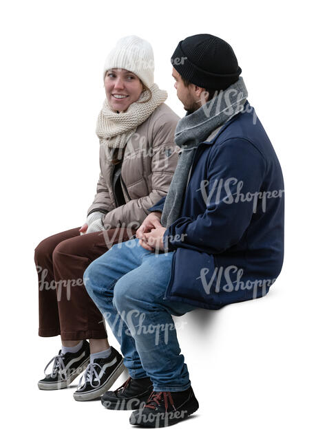 man and woman sitting in autumn and talking