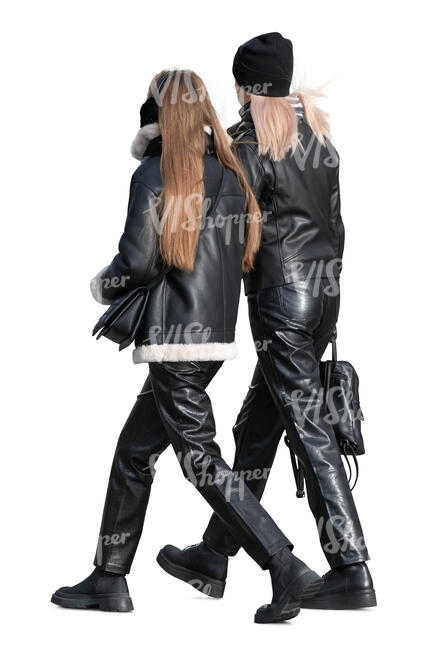 two women dressed in black leather walking