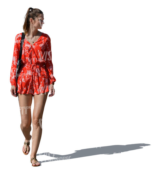 woman in a red summer dress walking