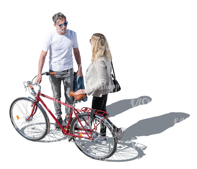 top view of a man and woman with a bike standing and talking