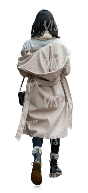 woman in a white hooded autumn coat walking