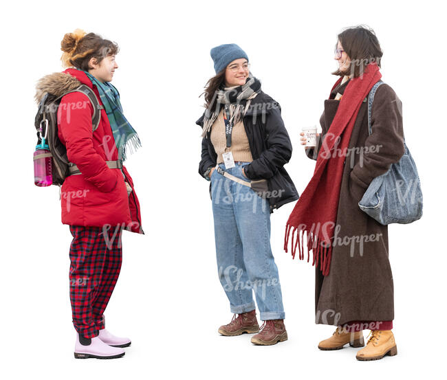 group of three women in winter standing and talking