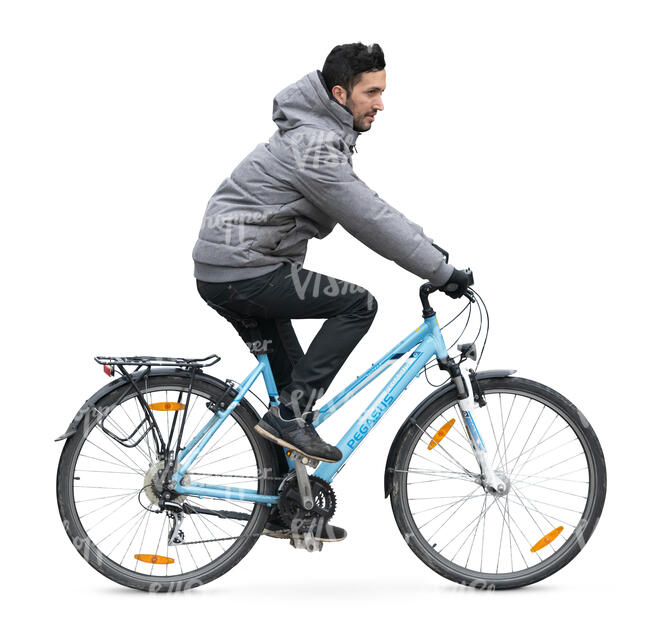 man in a grey jacket riding a bike