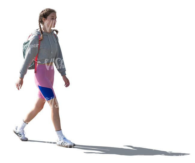 woman in biker shorts walking