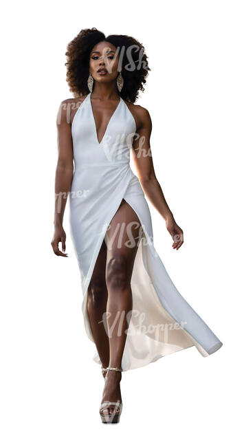 black woman in an elegant white dress walking