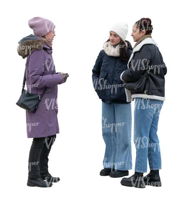 three women standing outside in winter and talking