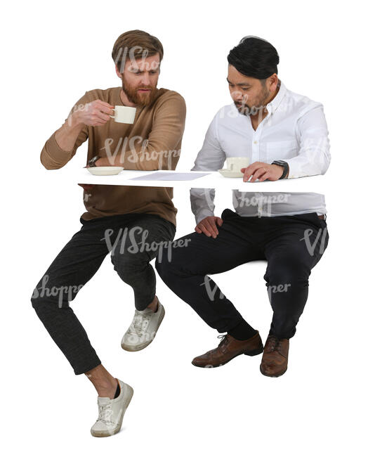 two men sitting in a coffee bar and talking