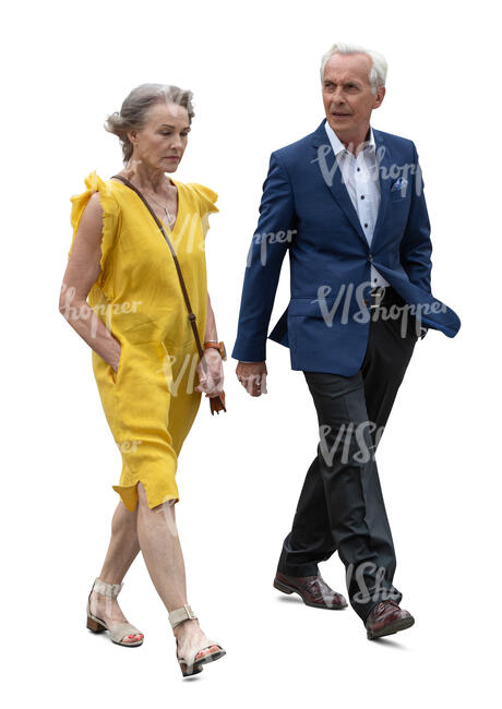 senior couple in formal outfits walking