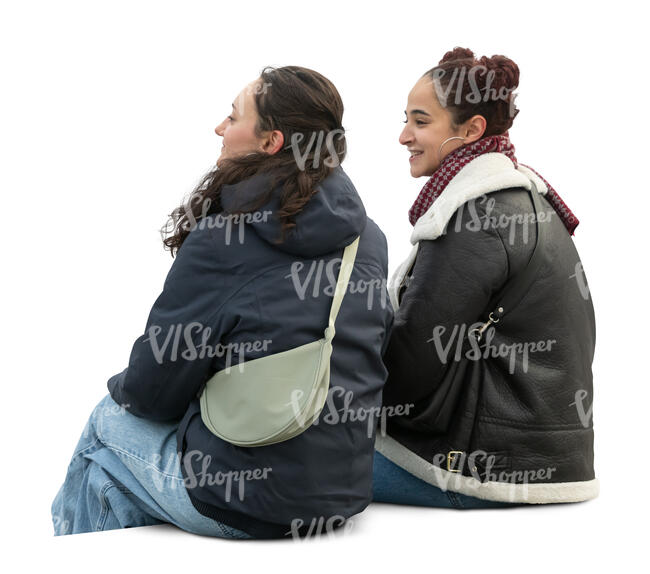 two women sitting outside