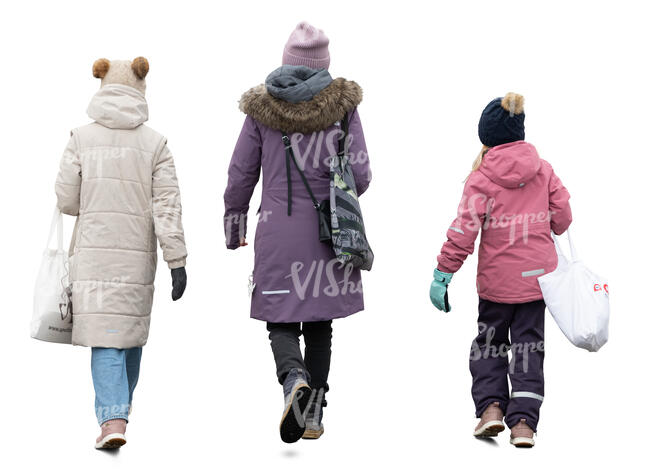 woman and two girls in winter walking