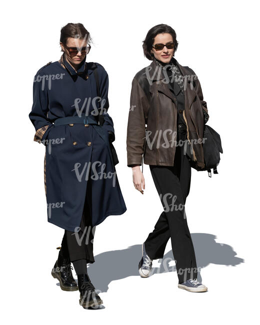 two women walking on a sunny autumn day