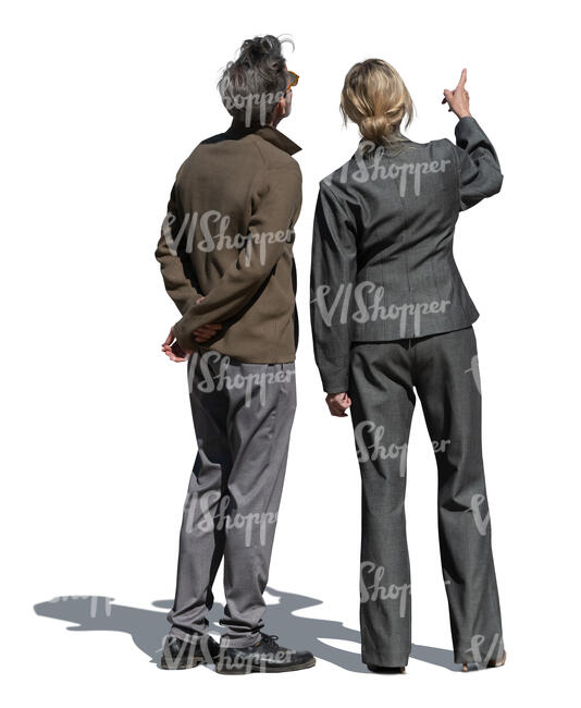 man and woman pointing at smth and looking up