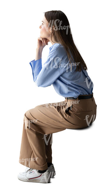 cut out woman sitting by the window and looking out