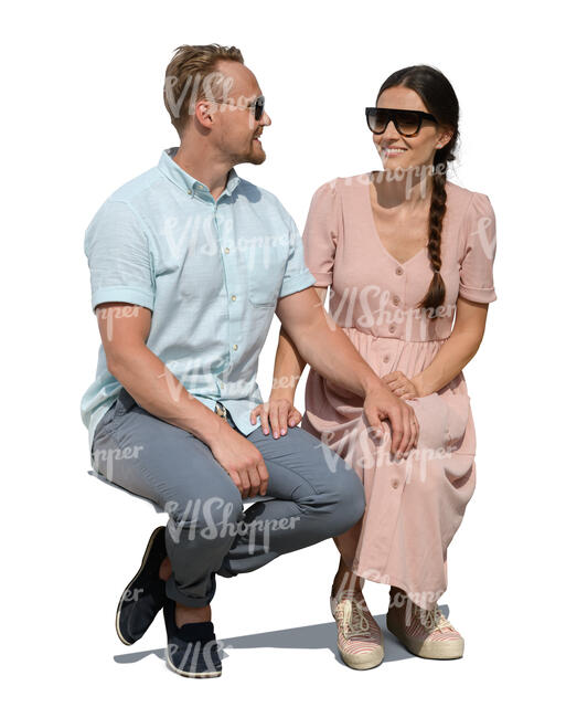 couple sitting and smiling at each other