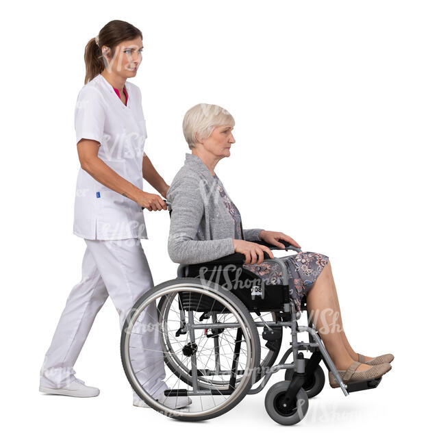 nurse pushing an elderly woman sitting in a wheelchair